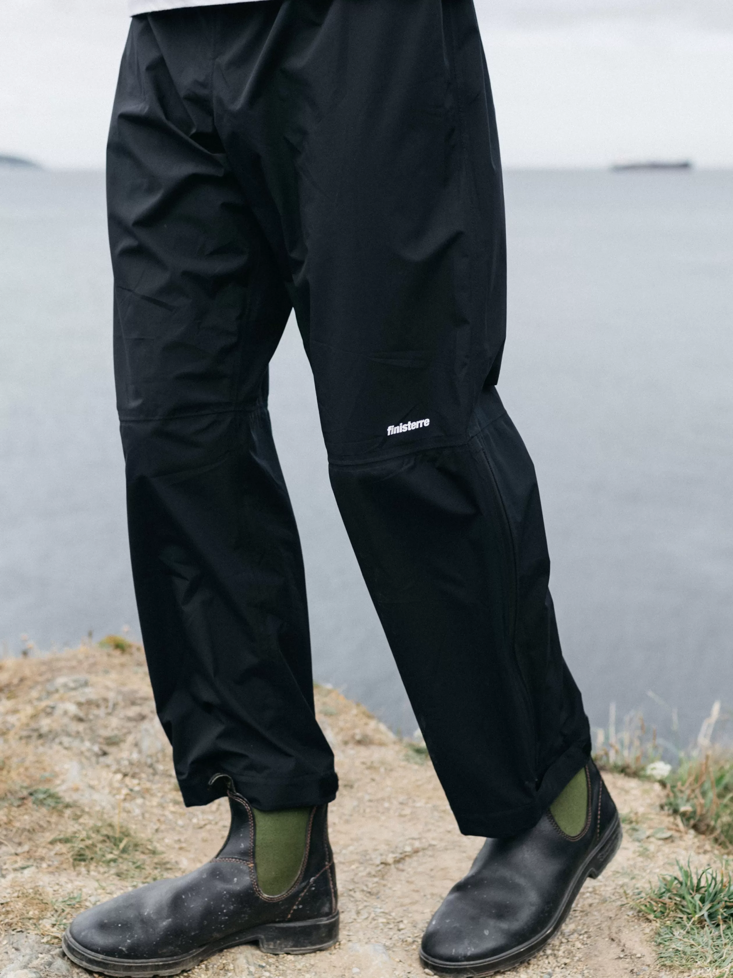 Finisterre Men's recycled lightweight waterproof trousers in < Trousers & Jeans